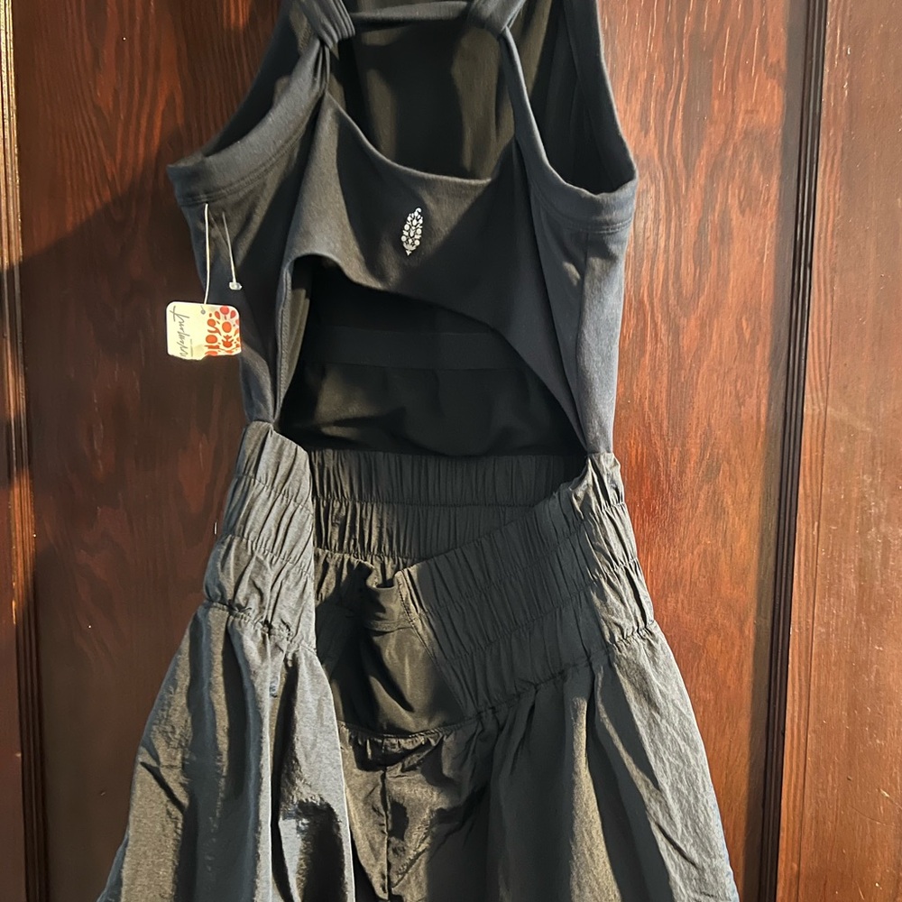 Free people movement NWT athletic romper size xl.